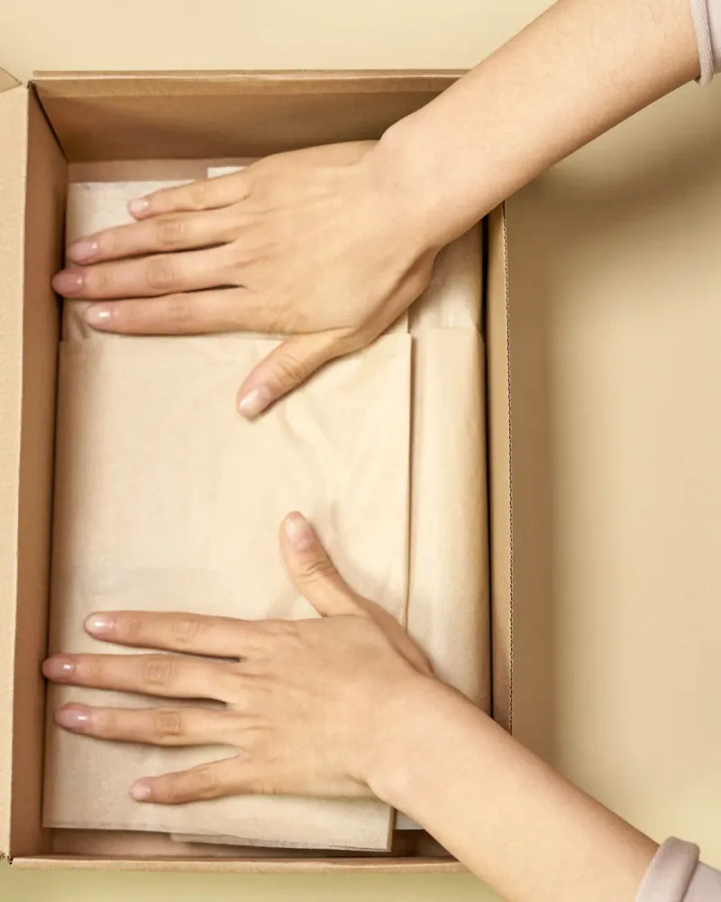 wrapped gift box tied with string