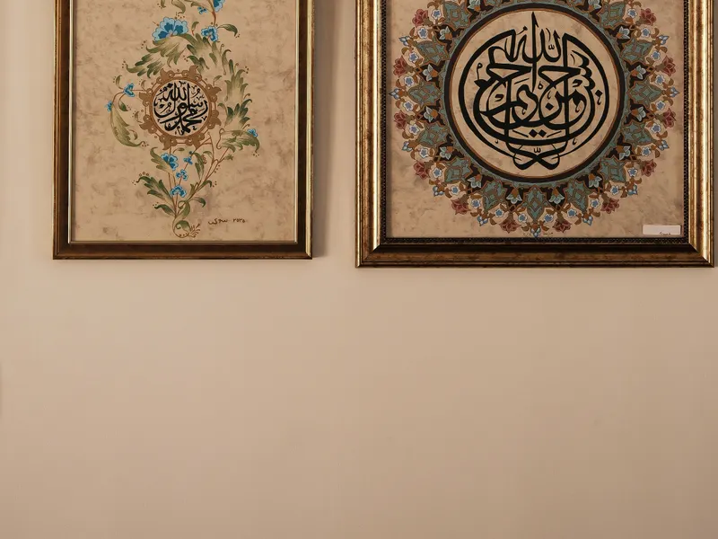 panel hung on a plastered wall