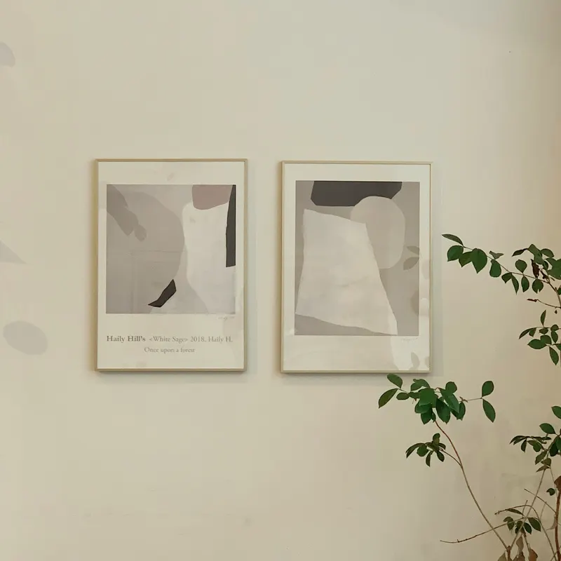 pair of framed ink wash panels