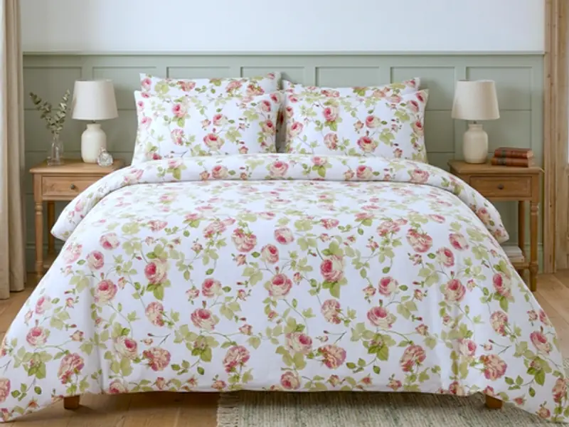 sateen sheets on a bed, side light