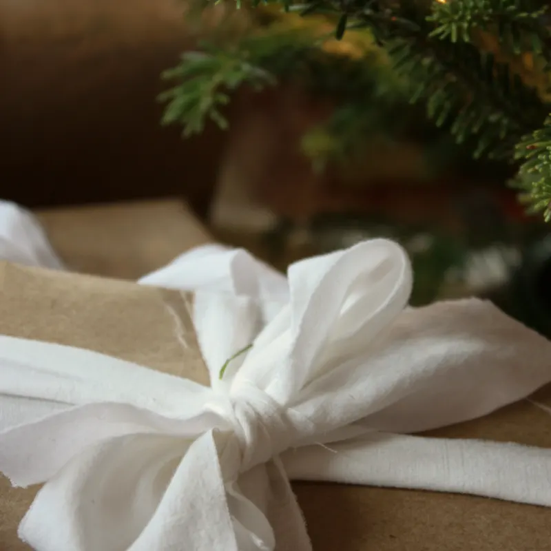 open bridal box with bedding and candles