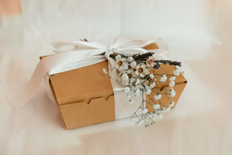 gift box with kraft paper and string, flat lay